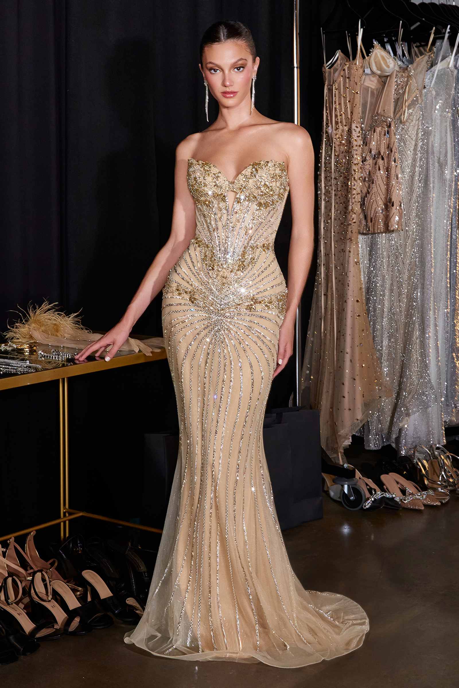Gold strapless mermaid gown with sweetheart neckline and heavily beaded detailing