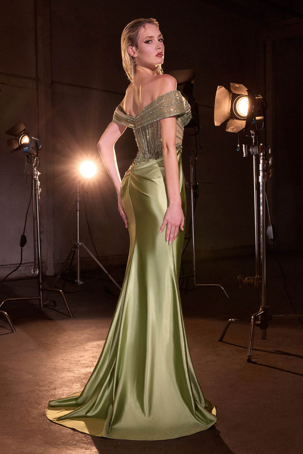 Green off-shoulder fitted gown with beaded bodice and long front slit