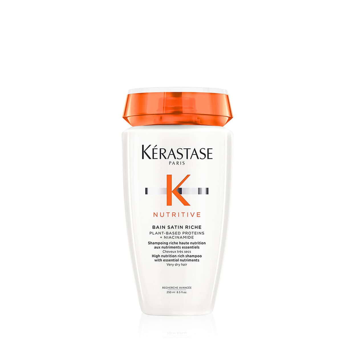 Kérastase Nutritive Bain Satin Riche shampoo bottle, white with orange cap