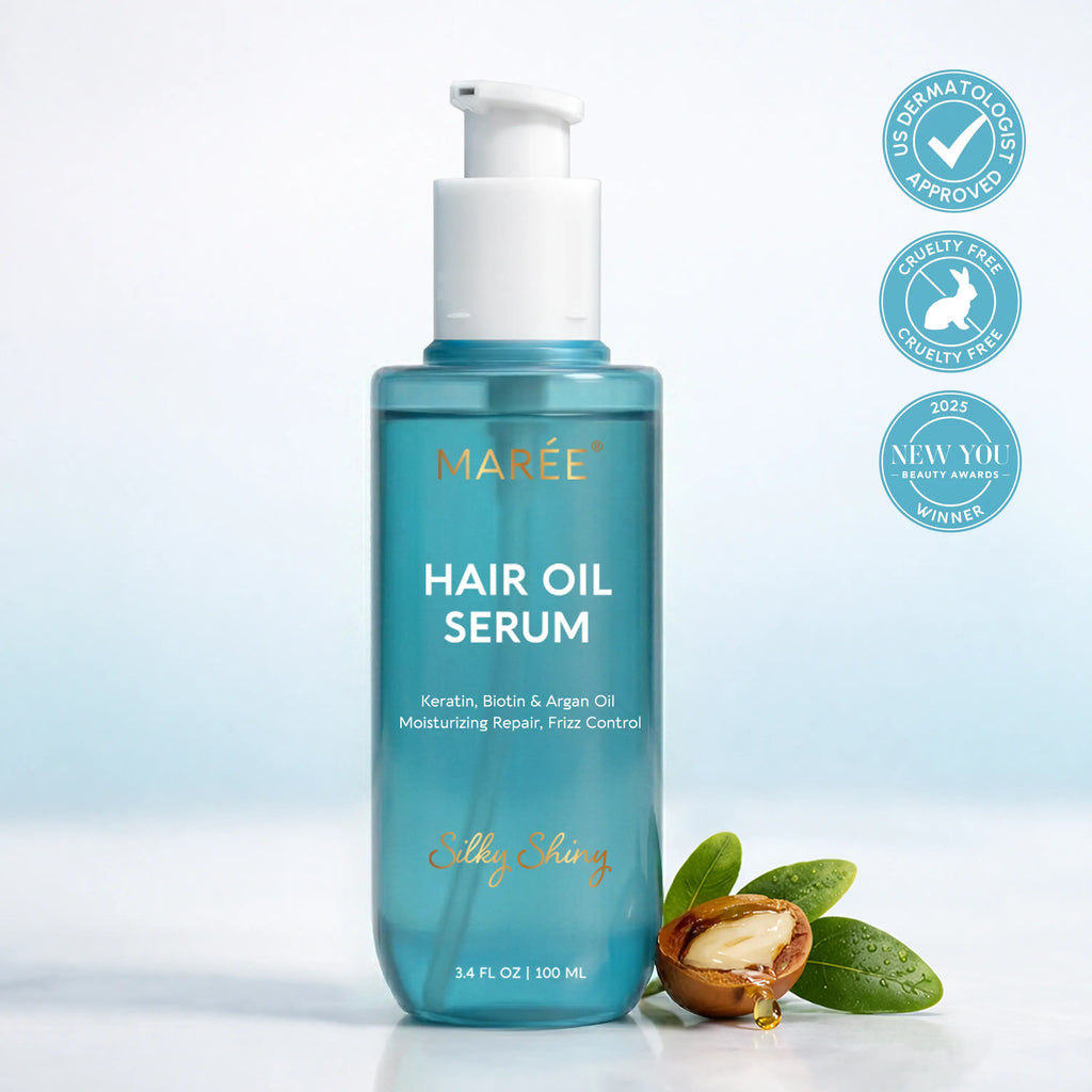Hair oil serum bottle with white pump, teal glass bottle with gold label details