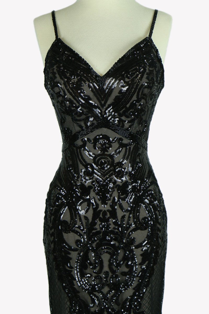 Black sequin evening gown bodice detail on mannequin, V-neckline and embellishment