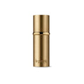 Gold cylindrical skincare concentrate bottle with matching metallic cap