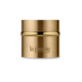 Gold La Prairie cream jar with lid and engraved la prairie logo