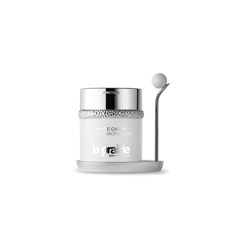 White eye cream jar with silver lid and metal applicator ball