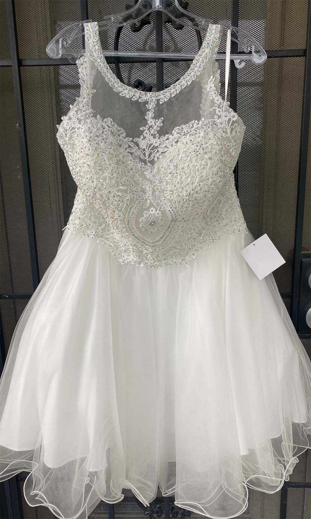 Off-white lace appliqued halter dress with sheer tulle skirt and fitted bodice