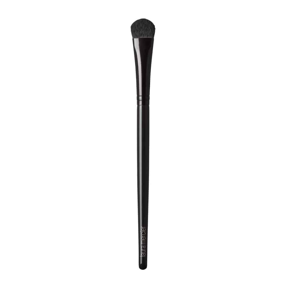 Laura Mercier eye color brush with soft rounded bristles and sleek black handle