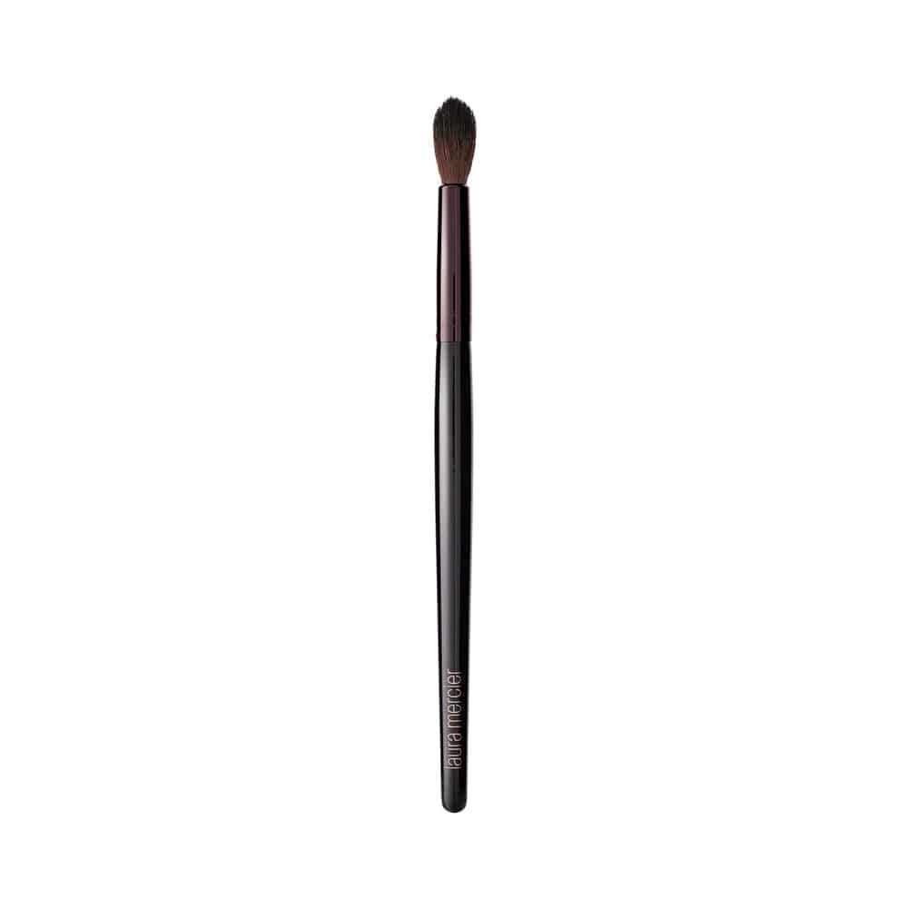 Finishing ponytail brush with tapered bristles and dark handle