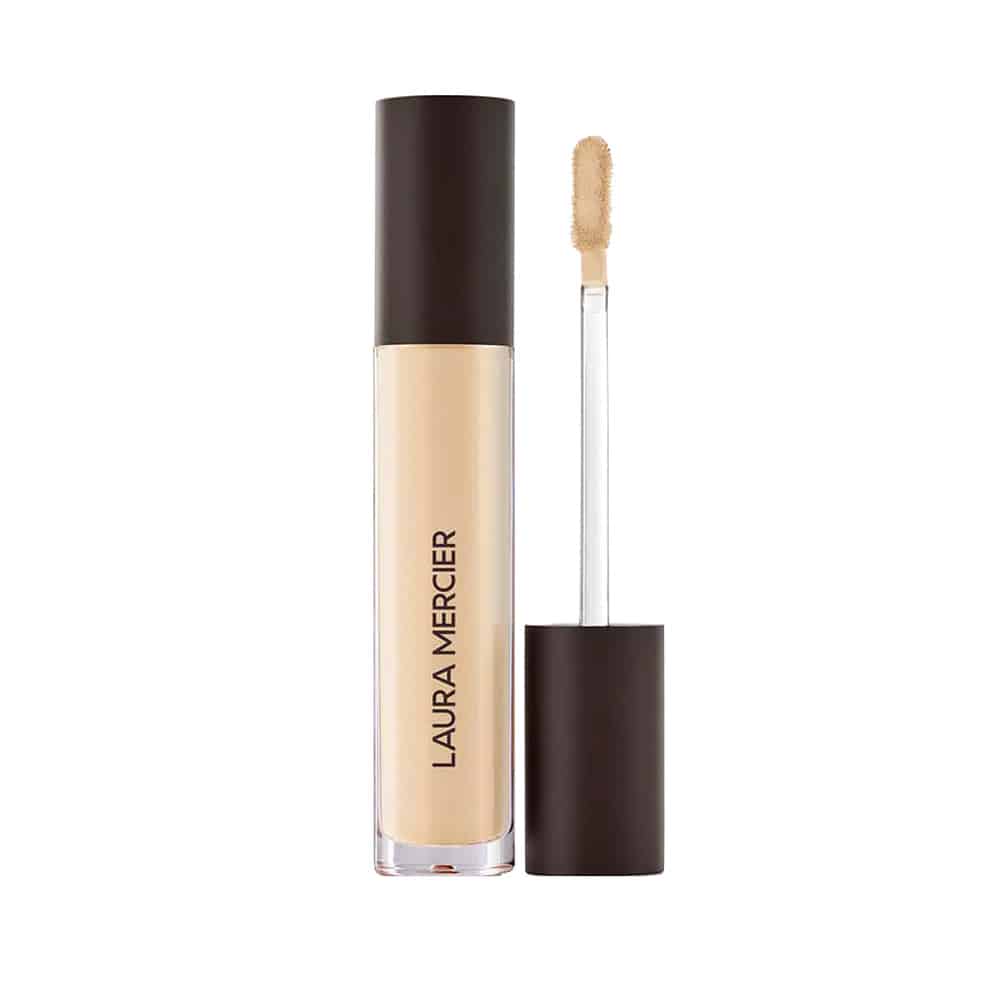Concealer in light beige tube with dark brown cap and doe-foot applicator