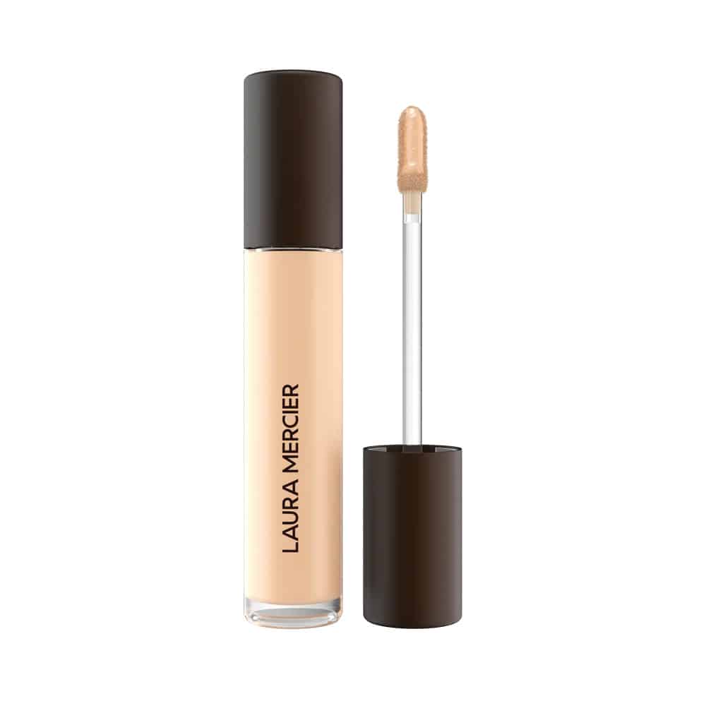 Concealer in medium neutral beige tube with dark brown cap and doe-foot applicator