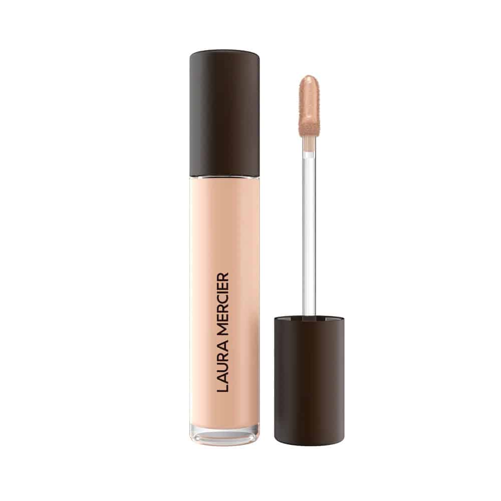 Concealer in warm beige tube with dark brown cap and doe-foot applicator
