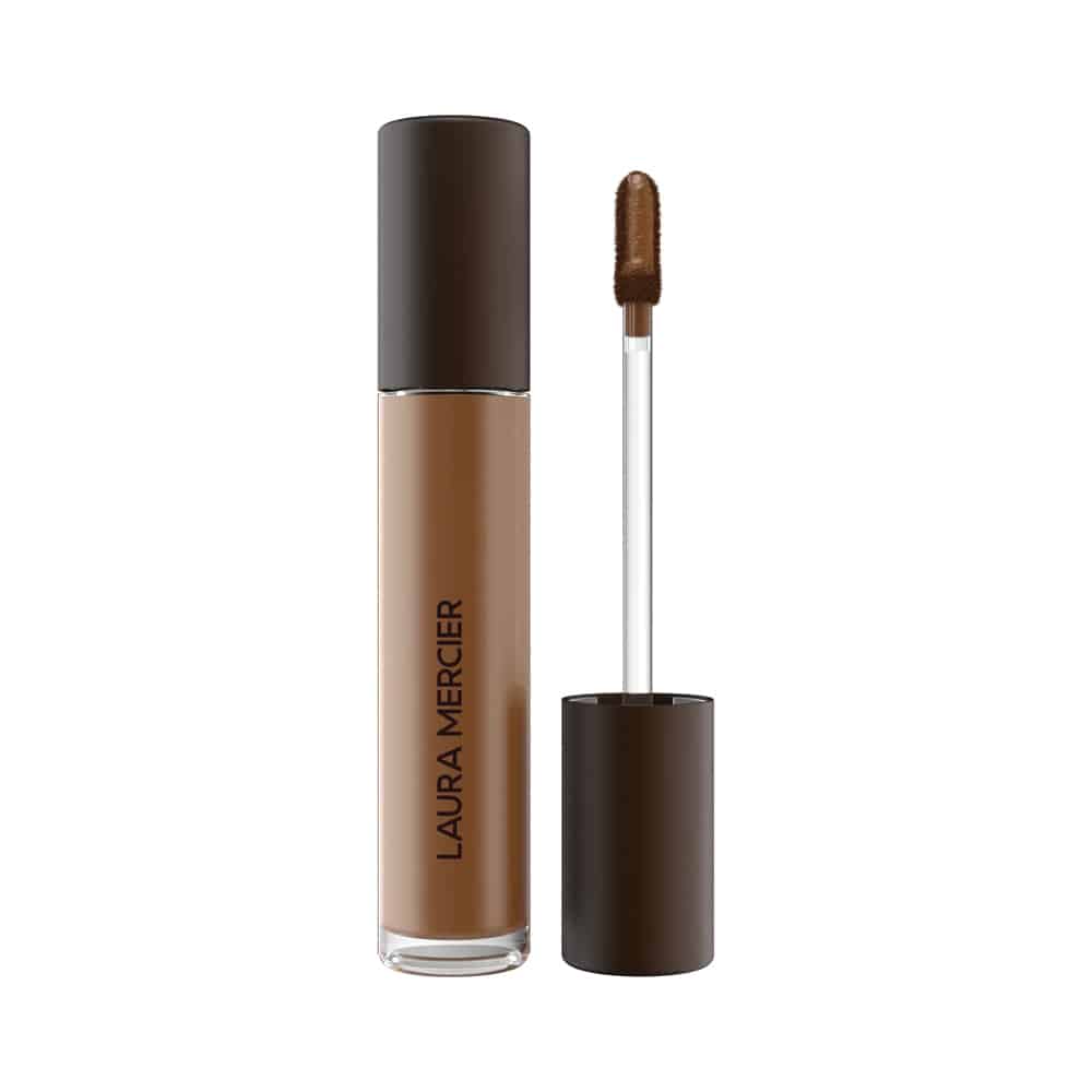 Concealer in medium brown-beige tube with dark brown cap and doe-foot applicator