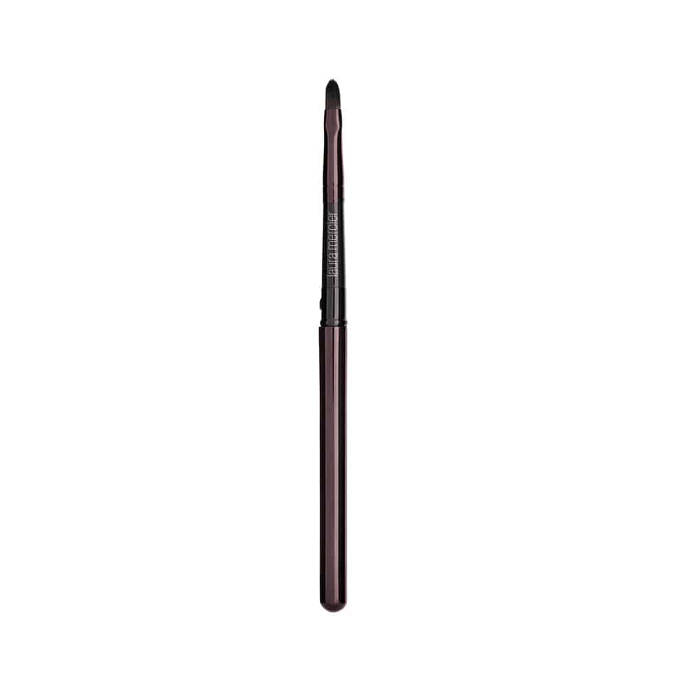 Lip color brush with slender dark handle and fine pointed bristles