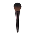 Powder brush with dark bristles and black tapered handle
