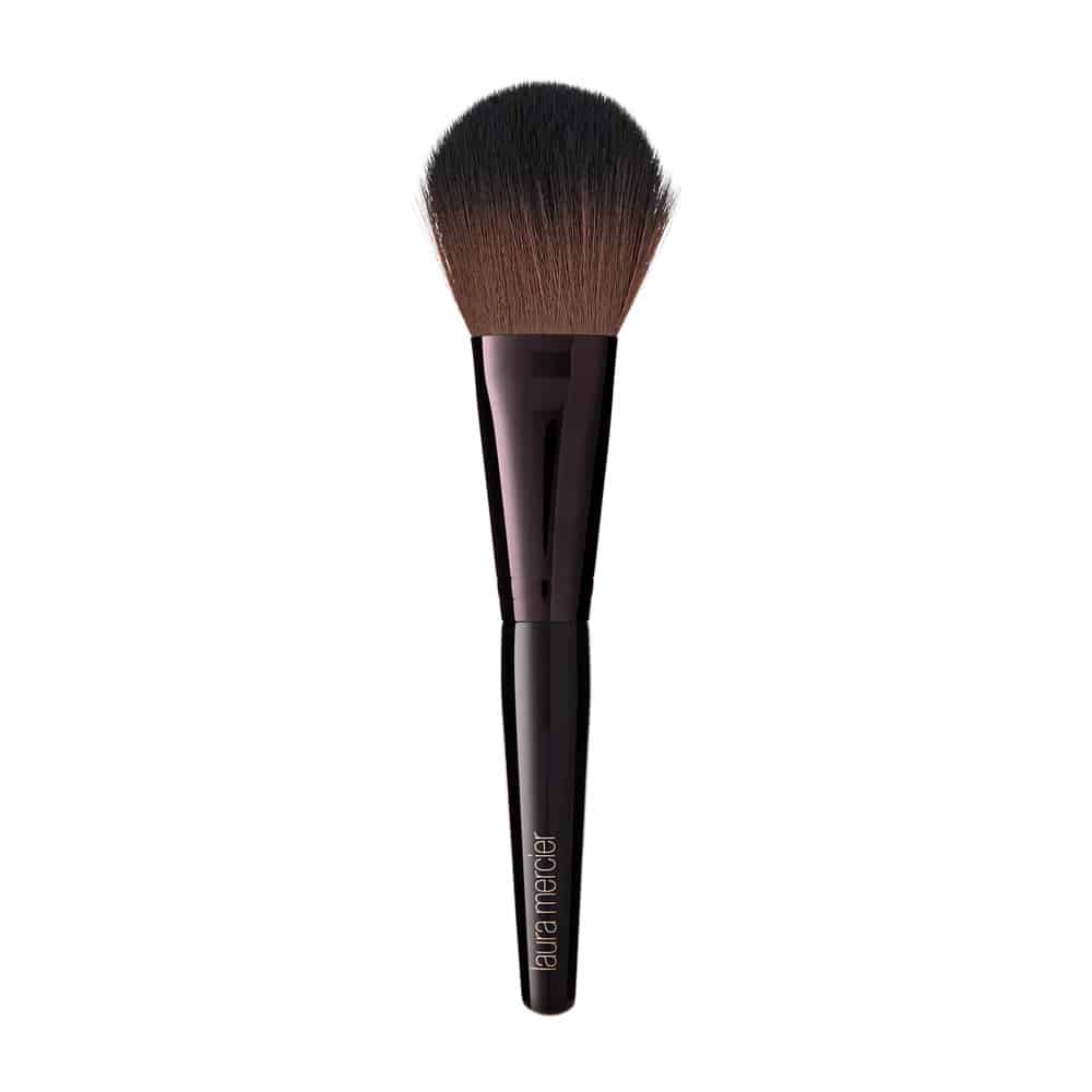Powder brush with dark bristles and black tapered handle