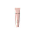 Laura Mercier face primer tube, illuminating mini, pink squeeze tube with label