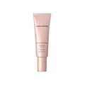 Laura Mercier illuminating primer in peach-toned squeeze tube