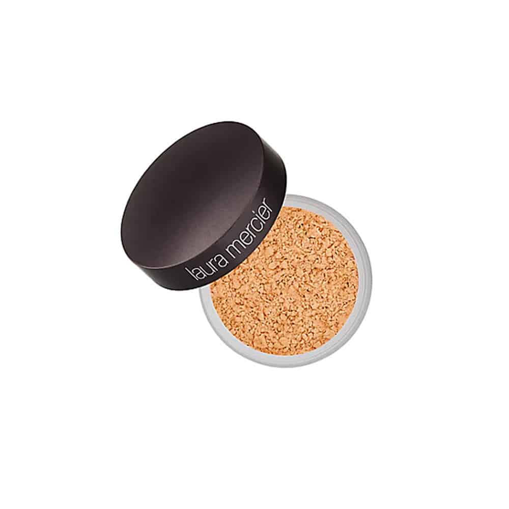 Brightening under-eye powder compact with tan powder and black lid