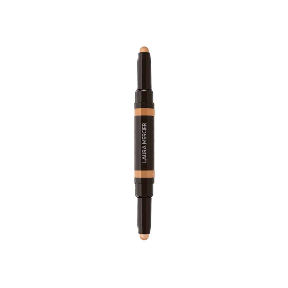 Concealer stick front view: beige tip with dark cap and orange middle label