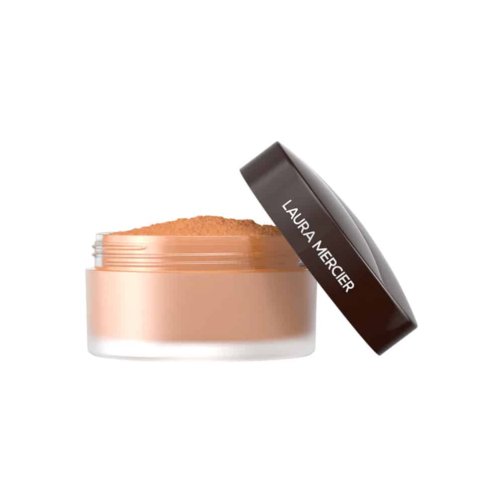 Laura Mercier translucent loose setting powder jar with dark cap; warm peach powder
