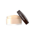 Laura Mercier translucent loose setting powder jar with dark cap; light beige powder