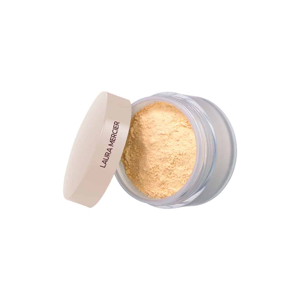 Laura Mercier loose setting powder jar with peachy beige powder and sifter lid