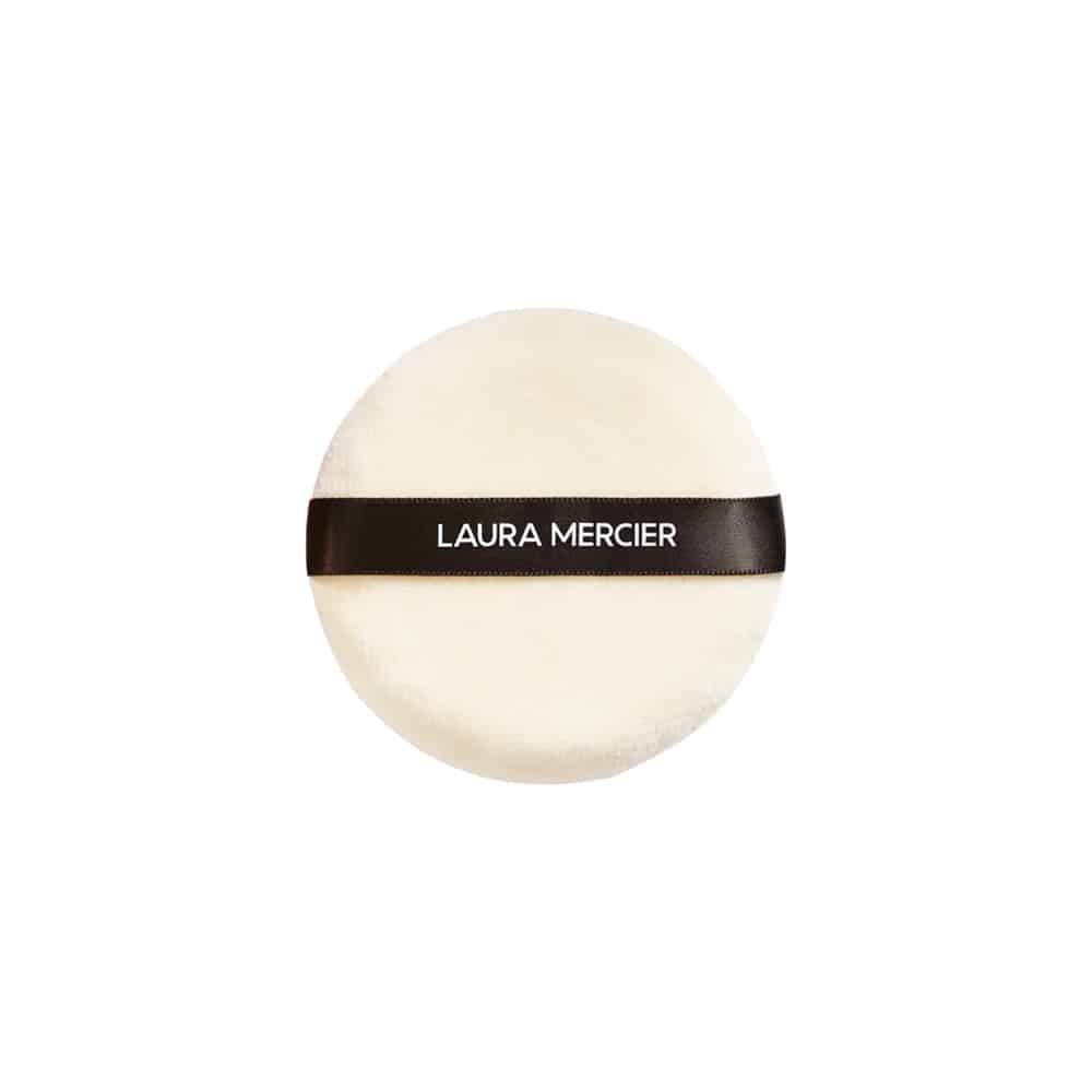 Laura Mercier velour powder puff, round cream cushion with black band