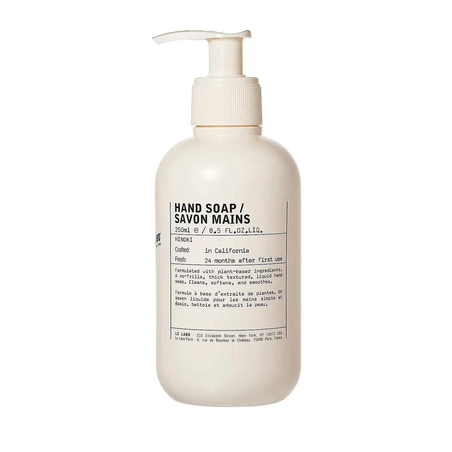Ivory hand soap bottle with white pump and front label