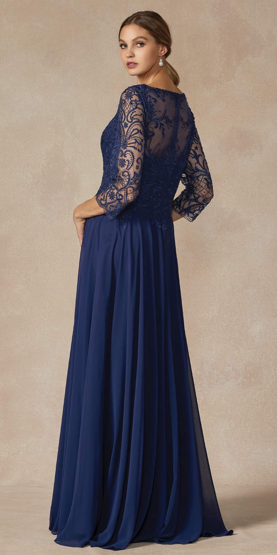 Navy long A-line dress with lace quarter sleeves, appliqued back and pleated skirt