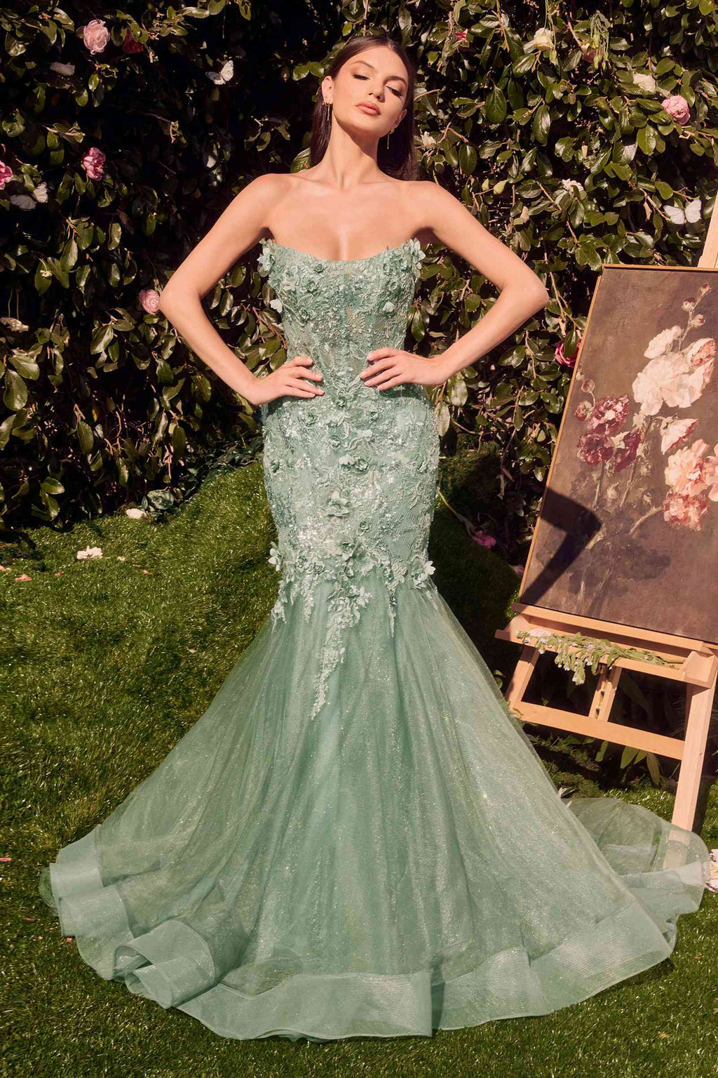 Green strapless mermaid gown with lace embellishments and flared tulle hem