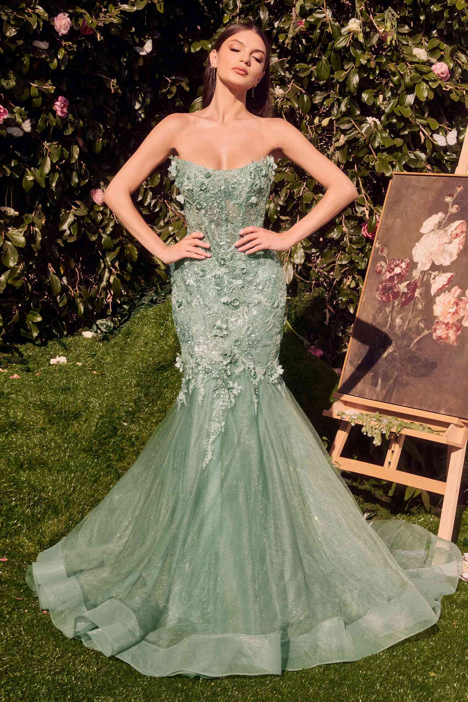 Green strapless mermaid gown with lace embellishments and flared tulle hem