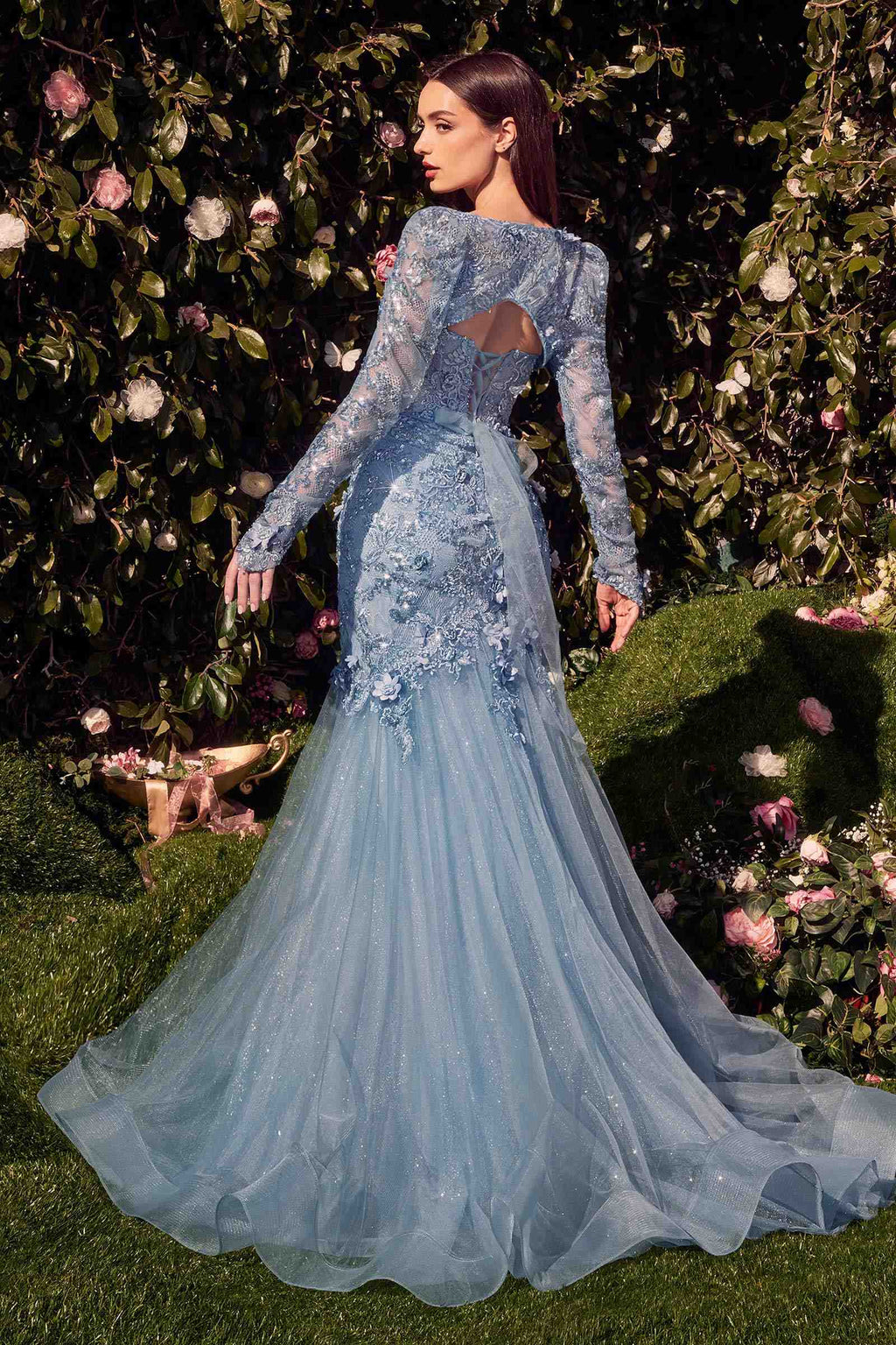 Smokey blue strapless mermaid gown with sheer long sleeves, shown from back