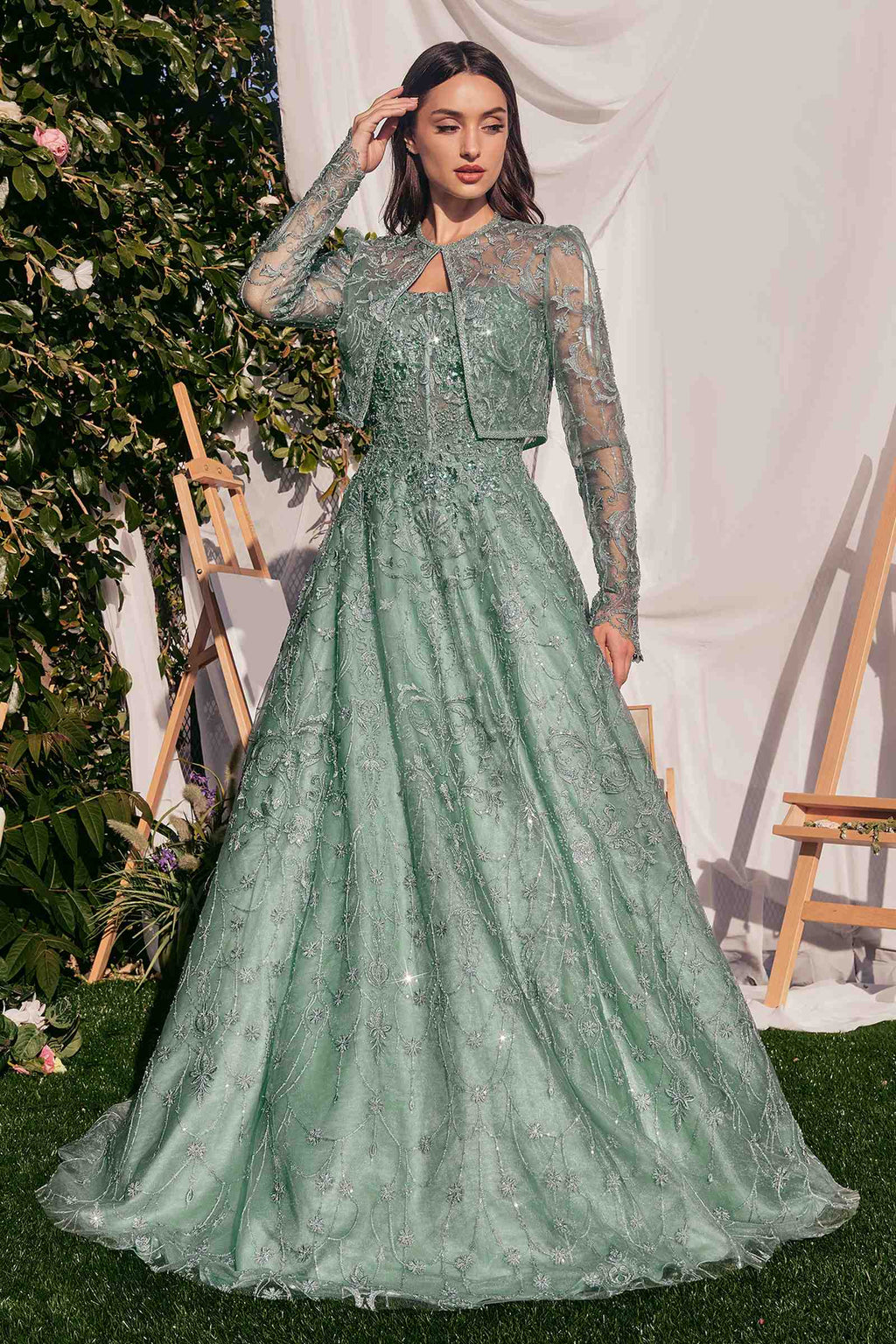 Teal lace ball gown with long sleeves and embroidered bodice, full skirt