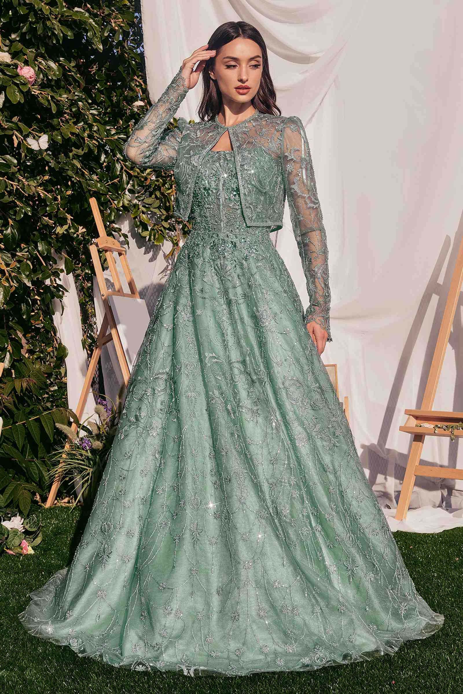 Teal lace ball gown with long sleeves and embroidered bodice, full skirt