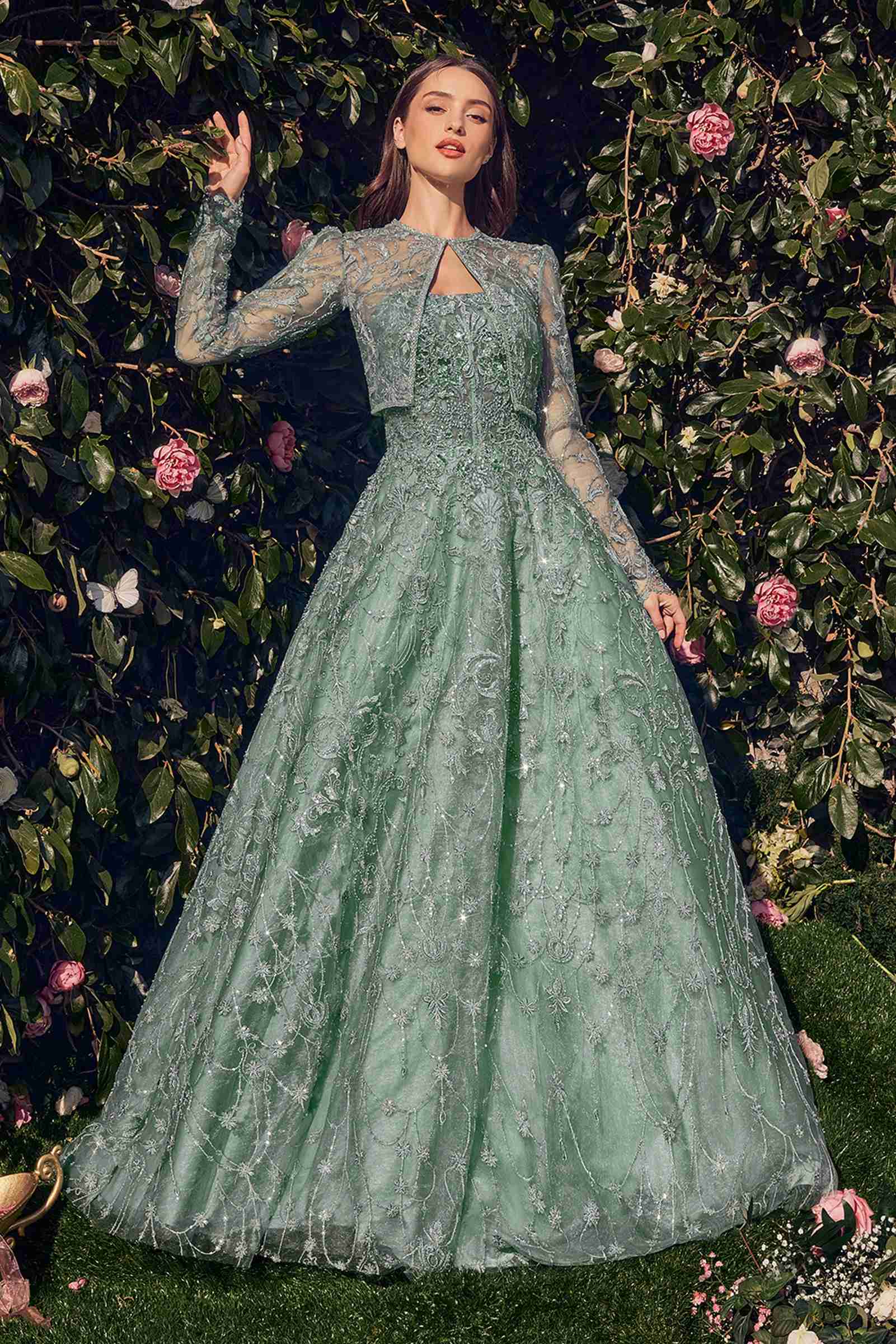 Teal lace strapless ball gown with long sleeves and full skirt