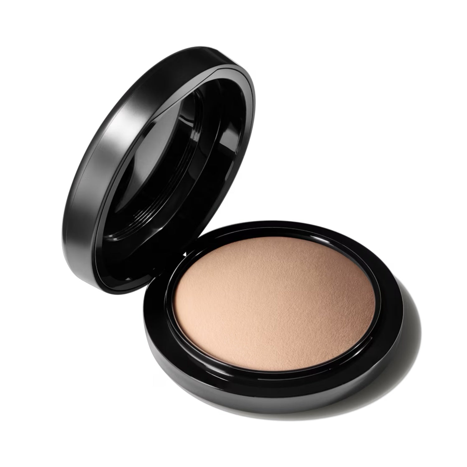 Face powder compact with open lid and light beige powder pan