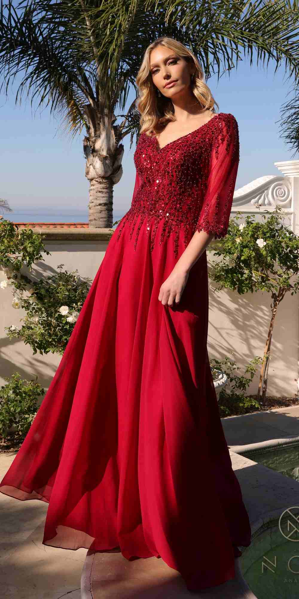 Burgundy sequin V-neck A-line gown with 3/4 sleeves and flowing long skirt
