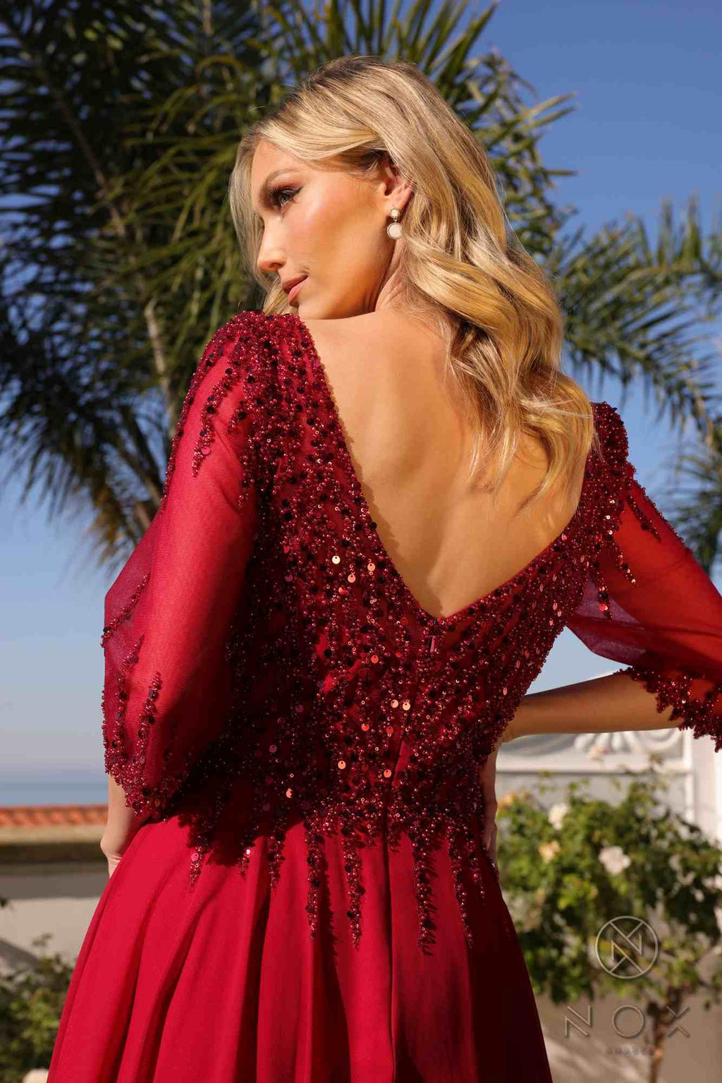 Burgundy sequin A-line gown, side view, V-neck bodice and 3/4 sleeves