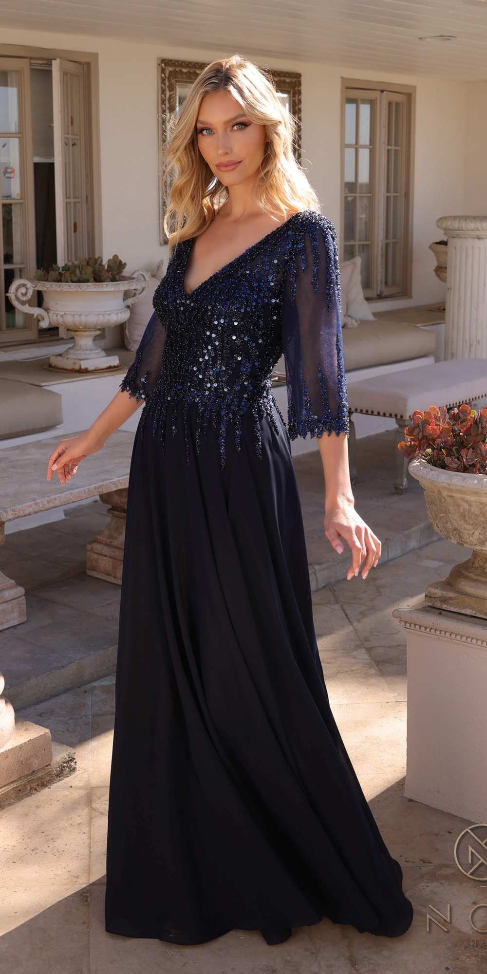 Dark navy sequin bodice A-line gown with 3/4 sleeves and V-neck