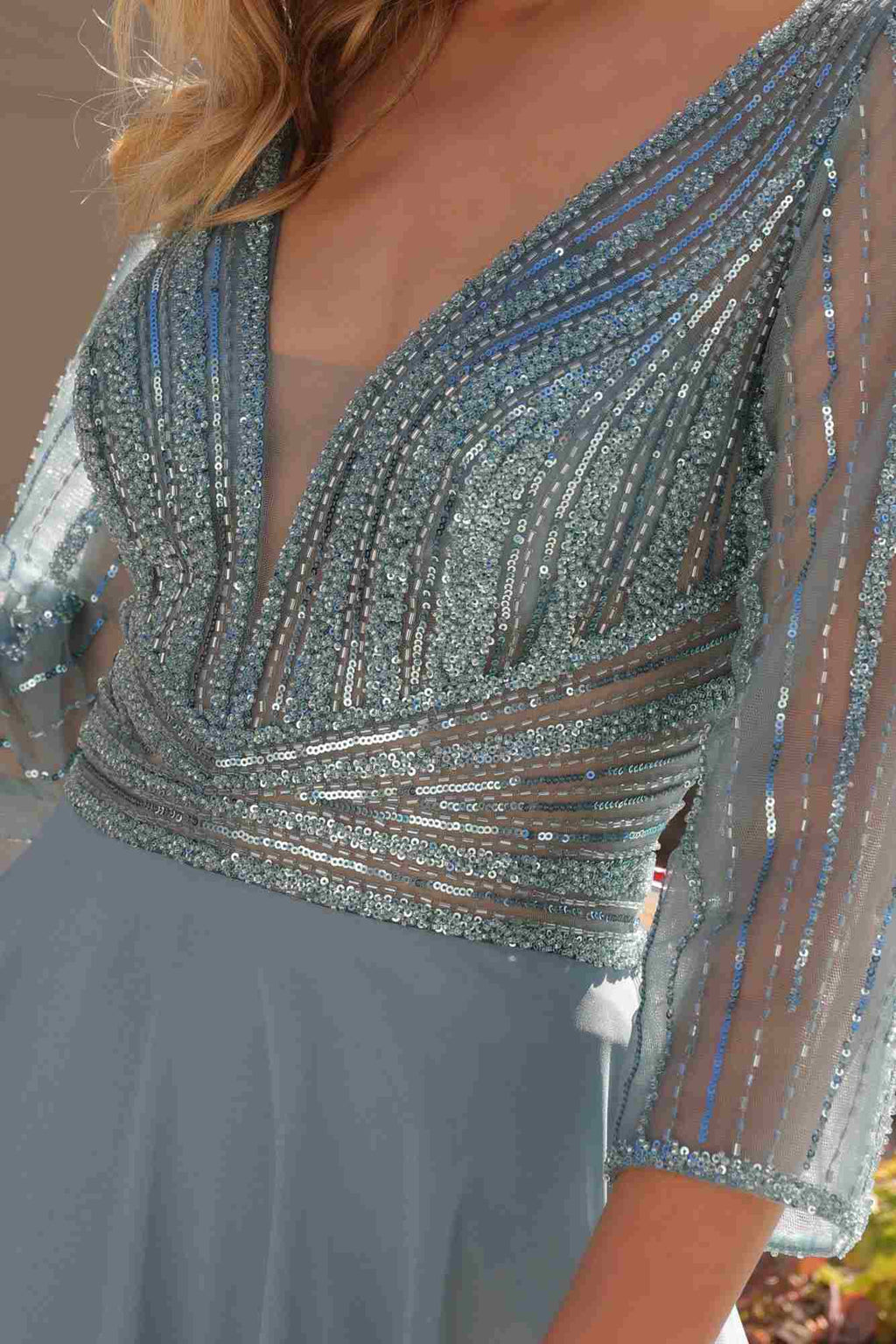 Sea blue embellished V-neck bodice detail with silver beading and 3/4 sleeve