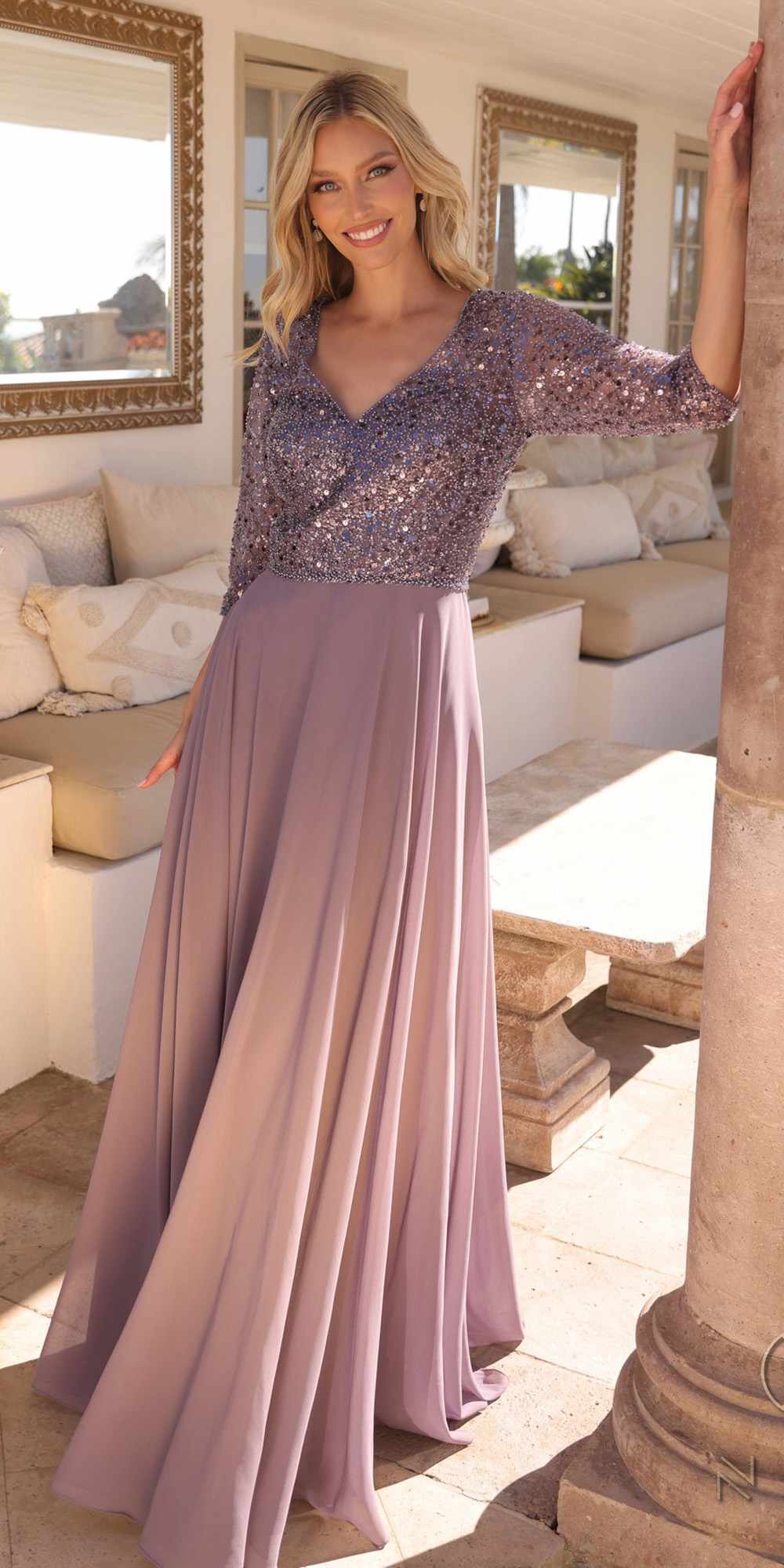 Burgundy sequin bodice A-line gown with V-neck and 3/4 sleeves, arm raised