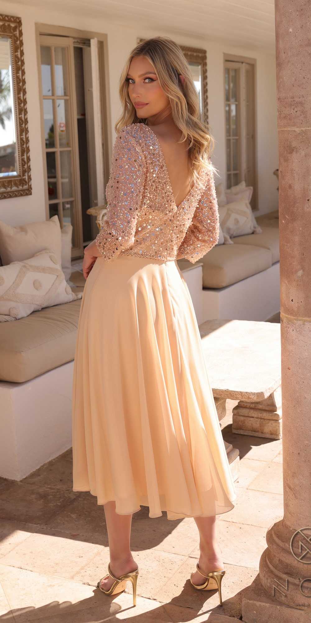 Tea-length sequin bodice dress with three-quarter sleeves, pale peach skirt