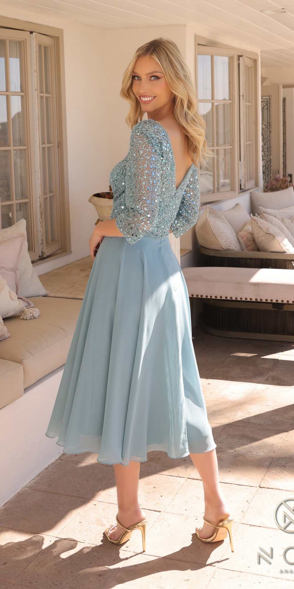Sea blue sequin bodice tea-length dress with V neckline and 3/4 sleeves