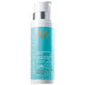 Curl defining cream bottle with silver pump, turquoise label and Moroccanoil logo