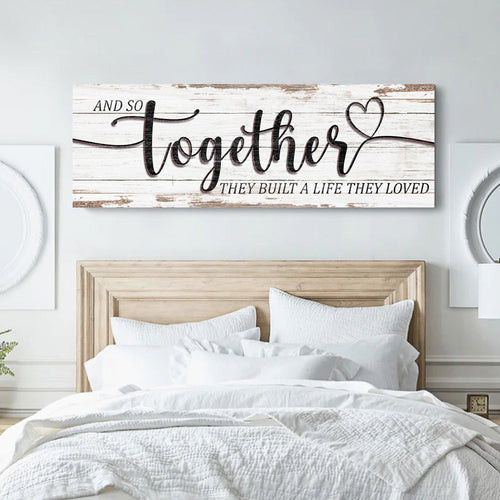 Wall canvas sign with 'Together' script, heart, and 'They built a life they loved' quote