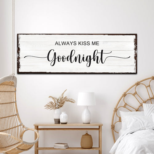 Framed wall art sign with black 'Always Kiss Me Goodnight' text on white
