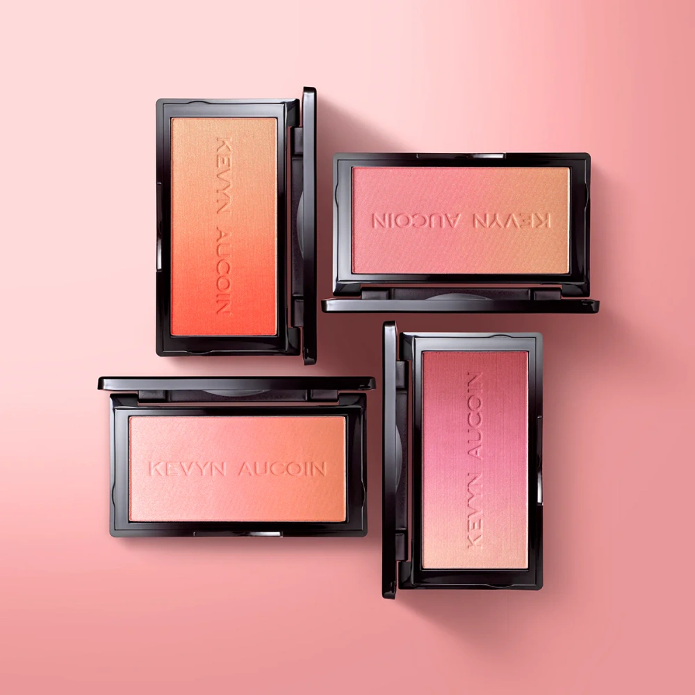 Set of four blush compacts with peach, rose, pink, and coral shades