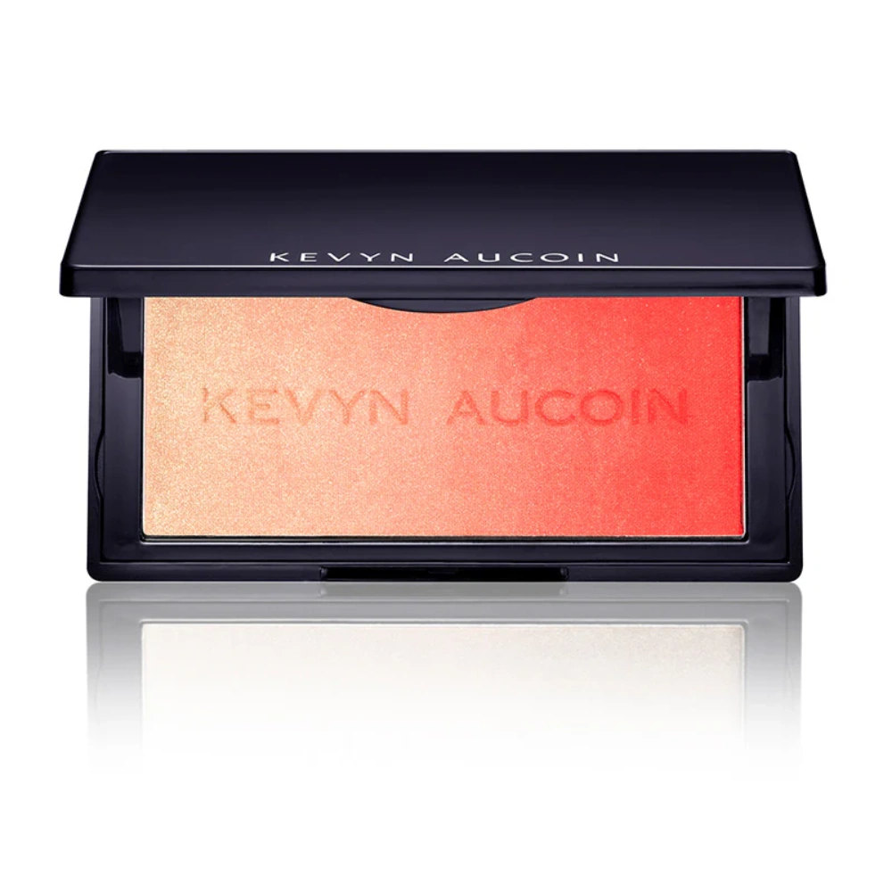 Shimmer blush compact with coral-red powder pan in black case