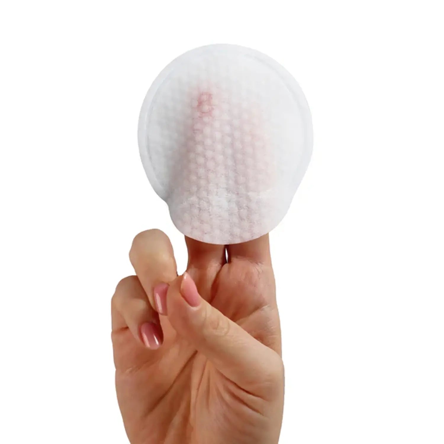Round white Neova peel pad held in hand, pre-dosed