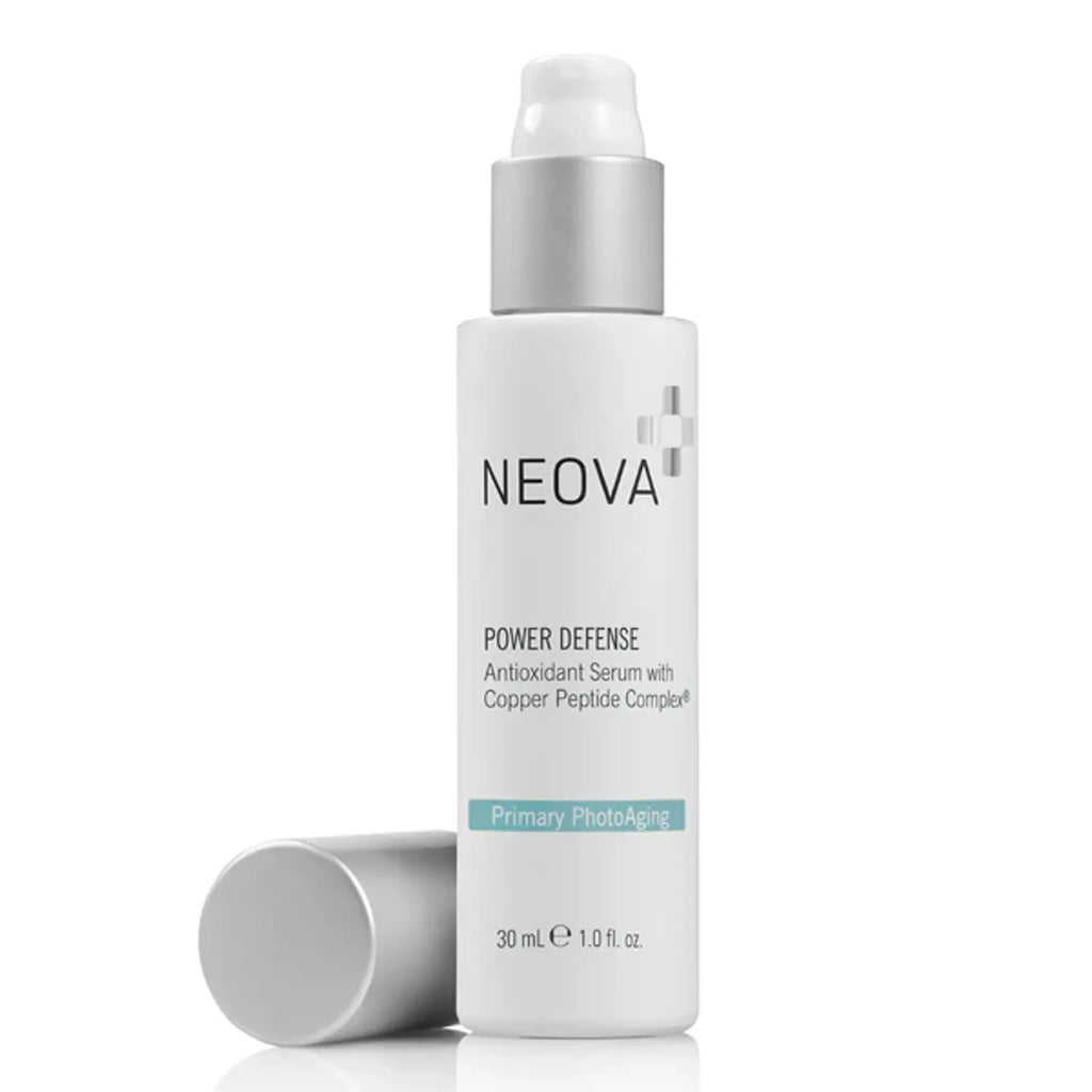 Neova Power Defense serum bottle with silver pump, off-white bottle