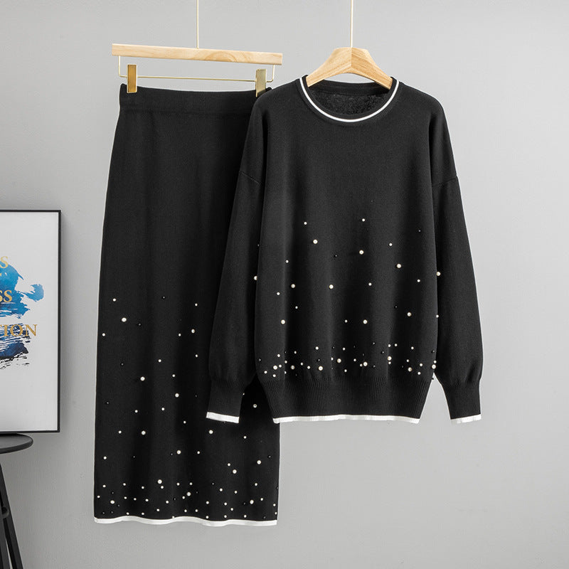 Black knit sweater and long skirt set with silver beaded dot embellishment